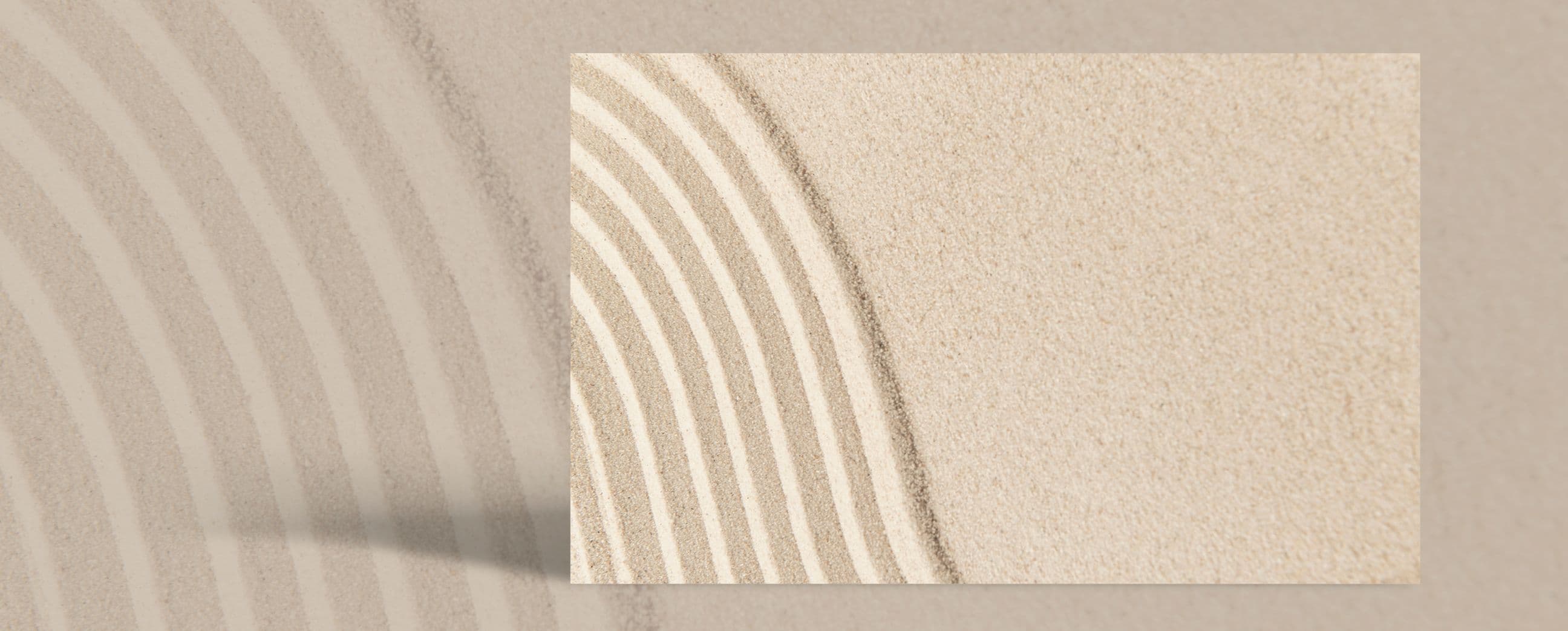 Raked sand in soft curved lines